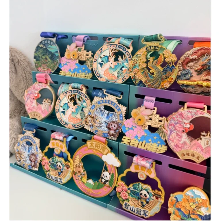 Collection of colorful custom metal medals displayed with printed ribbons.
