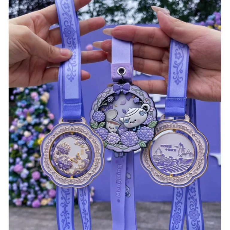 Three custom medals with purple printed ribbons and illustrated designs.