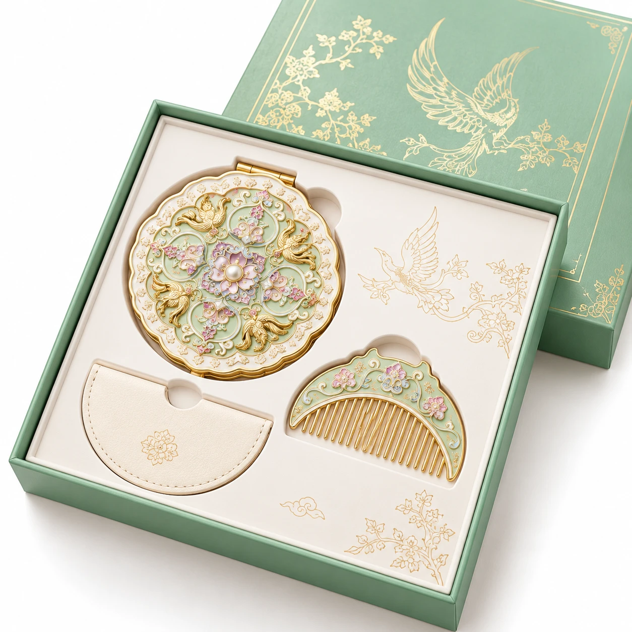 Mint green and gold-tone floral mirror and comb displayed in a matching presentation gift box.