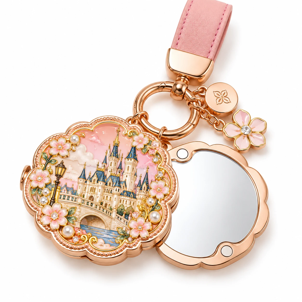 Rose gold-tone castle enamel folding keychain mirror with a pink strap and flower charm.